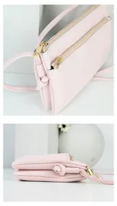 Detail view of pink PU crossbody phone bag showing double zippers and side profile