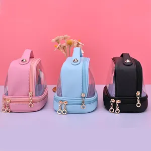 Neceser impermeable de doble capa en rosa, azul y negro con parte superior transparente