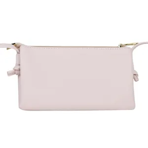 Minimalist pink PU leather crossbody phone bag with zipper closure on white background.