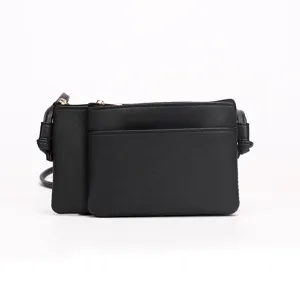Minimalist black PU leather crossbody bag with cross-hatch texture on white background