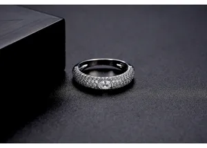 Detailed macro view of a shimmering silver ring featuring intricate micro-pave zircon setting