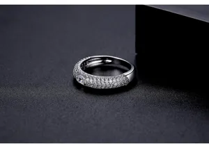 Macro view of a shimmering silver ring with detailed micro-pavé set cubic zirconia stones