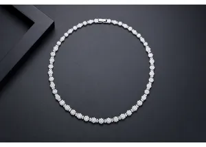 Detailed close-up of a luxurious bridal flower necklace with sparkling cubic zirconia stones