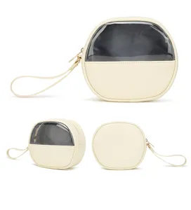 Viste dettagliate di una borsa cosmetica rotonda in PU con finestra trasparente