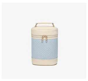 Premium zylindrische Kosmetiktasche mit blauem Flechtmuster und goldenen Reißverschlussdetails