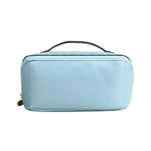 Neceser de viaje de cuero PU azul claro con asa y dije de cremallera dorado