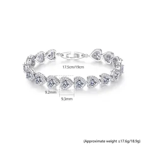 Elegante pulsera de corazón de plata con circonitas y marcas de dimensiones