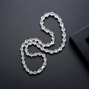 Elegant floral bridal necklace with copper inlaid cubic zirconia in silver finish.