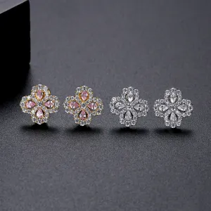 Elegant four-petal flower stud earrings with pink and clear cubic zirconia stones