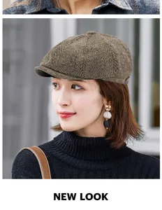 Detail view of a brown herringbone newsboy cap worn by a model in a casual retro style