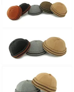 Detailed view of multiple color vintage knit ribbed brim Miki hats with striped details