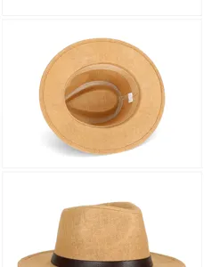Dettaglio di cappello Panama in paglia di carta intrecciata con fascia a fibbia marrone.