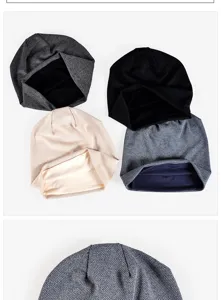 Close-up of textured knit beanie hats in multiple colors for a versatile winter style.