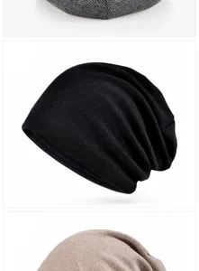 Close-up view of a black knitted slouchy beanie with granular texture