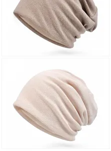 Close-up view of the cotton grain weave slouchy beanie hat showing knit texture details