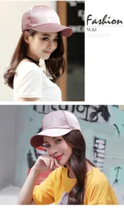 Detail view of pink satin baseball cap for women worn by model outdoors