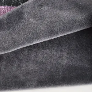 Detailed view of the soft gray fleece lining of a winter beanie hat for warmth.