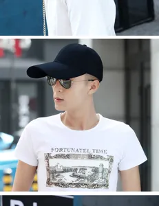 Detailed side view of an Asian man wearing a minimalist black baseball cap outdoors