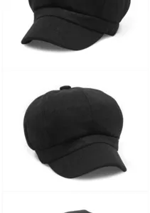 Detailed close-up showing the wool fabric texture of a black newsboy baker boy cap.