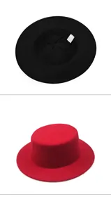 Macro view of retro flat top hat interior tag and texture of red boater style fedora cap