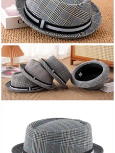 Close-up of classic plaid pattern on vintage short-brimmed fedora hat for men and women