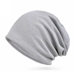Unisex grey cotton slouchy beanie with granular textured knit for casual outdoor wear