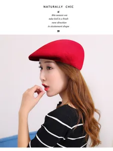 Side profile of a woman wearing a vibrant red wool ivy cap for winter style