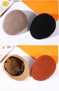 Detailed macro view showing the wool texture of multiple retro painter hats in various colors.