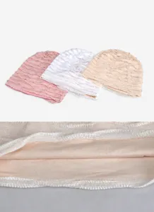 Close-up of hollow breathable thin cotton headscarf with ruffled texture detail
