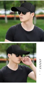 Outdoor lifestyle shot of a black mesh baseball cap with an extra-long sun brim