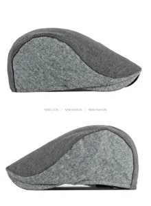 Side profile detail of retro patchwork wool beret hat with herringbone pattern texture