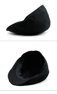 Detailed view of black cotton flat cap showing interior lining and short brim detail