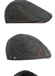 Detail view of vintage British style wool flat cap with brown leather patchwork accents.