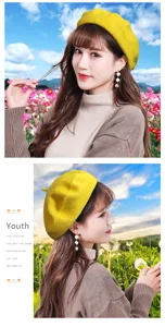 Asian model showcases the yellow wool beret hat in a beautiful sunny floral field setting