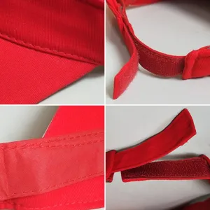 Detail view of a vibrant red wide brim sun visor hat featuring an adjustable velcro strap