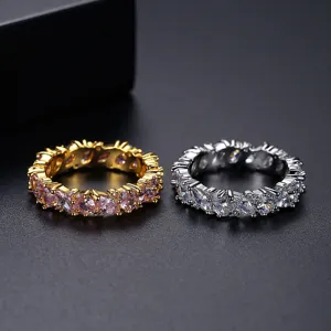 Elegantes anillos de eternidad de circonita talla marquesa en oro y plata para mujer.