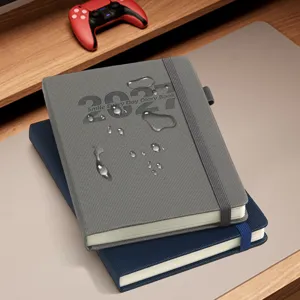 Détail de l'agenda 2027 avec texture verticale et surface de couverture étanche.