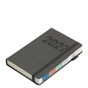 Cahier de planificateur quotidien gris 2027 avec couverture à nervures et fermeture élastique