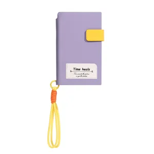 A6 Notizbuch in Lavendel und Gelb mit Schlüsselband und Schnallenverschluss, minimalistisch