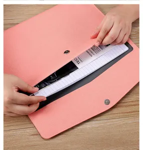Detail view of the pink faux leather A4 document bag showing laptop storage capacity