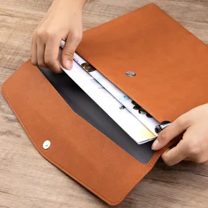 Professional A4 tan leather file folder with magnetic closure and documents