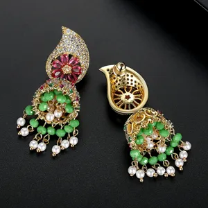 Luxurious Bohemian Indian Jhumka earrings with green beads and white pearl tassels