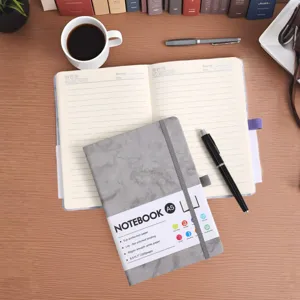 Detailed view of the A5 marble texture business notebook with elastic closure
