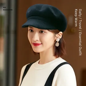 Classic black wool newsboy hat for women featuring a stylish baker boy design for winter.
