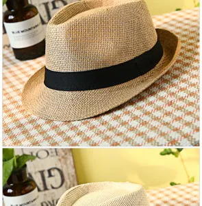 Detailed close-up showing the texture of a breathable straw jazz hat with a black band