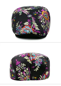 Detailed view showing ethnic style floral embroidery and back adjustment on black beret