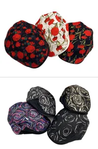 Detailed view of women's fashion floral embroidered berets in multiple stylish patterns