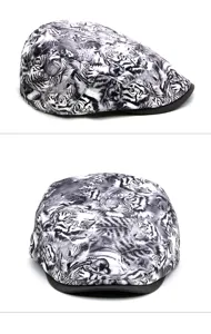 Close-up detail of a stylish black and white tiger print beret cap in two angles