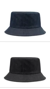 Macro detail of breathable denim bucket hats in navy blue and black for sun protection