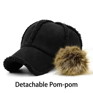 Stylish black suede baseball cap with a detachable brown fur pom-pom for winter.